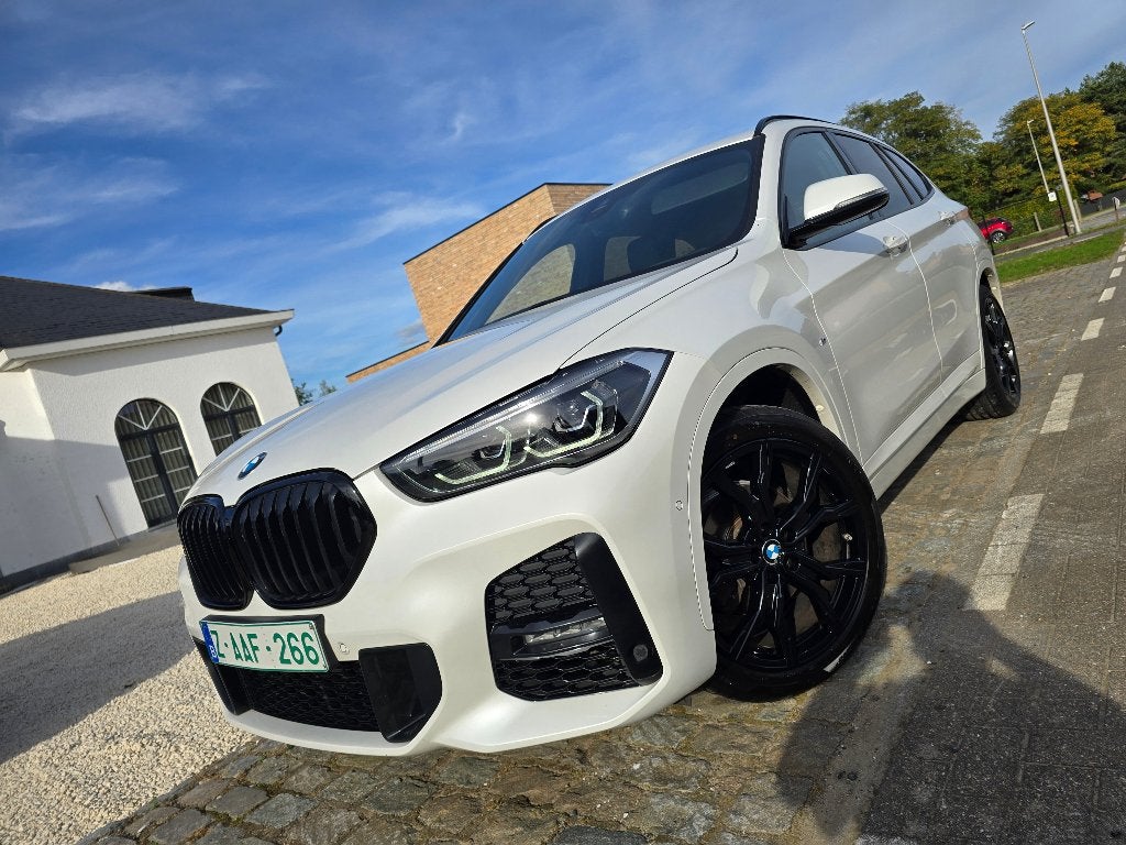 BMW X1 sDrive18i -M Pack- Automaat - Carplay - Parelmoer wit, Autos, X1, Achat, Entreprise, Carnet d'entretien
