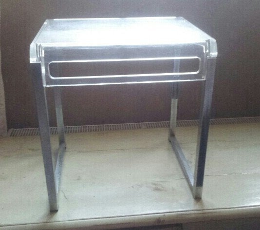Plexiglas tafeltje..., Ophalen