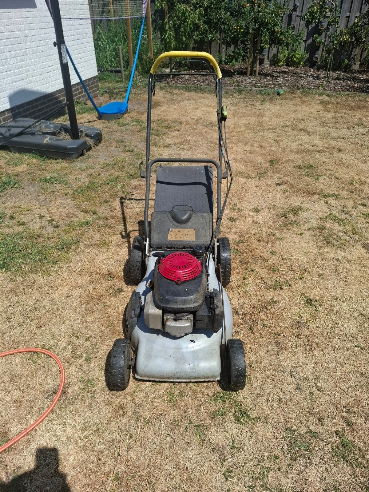 Grasmaaier met honda motor zelftrekker, Ophalen