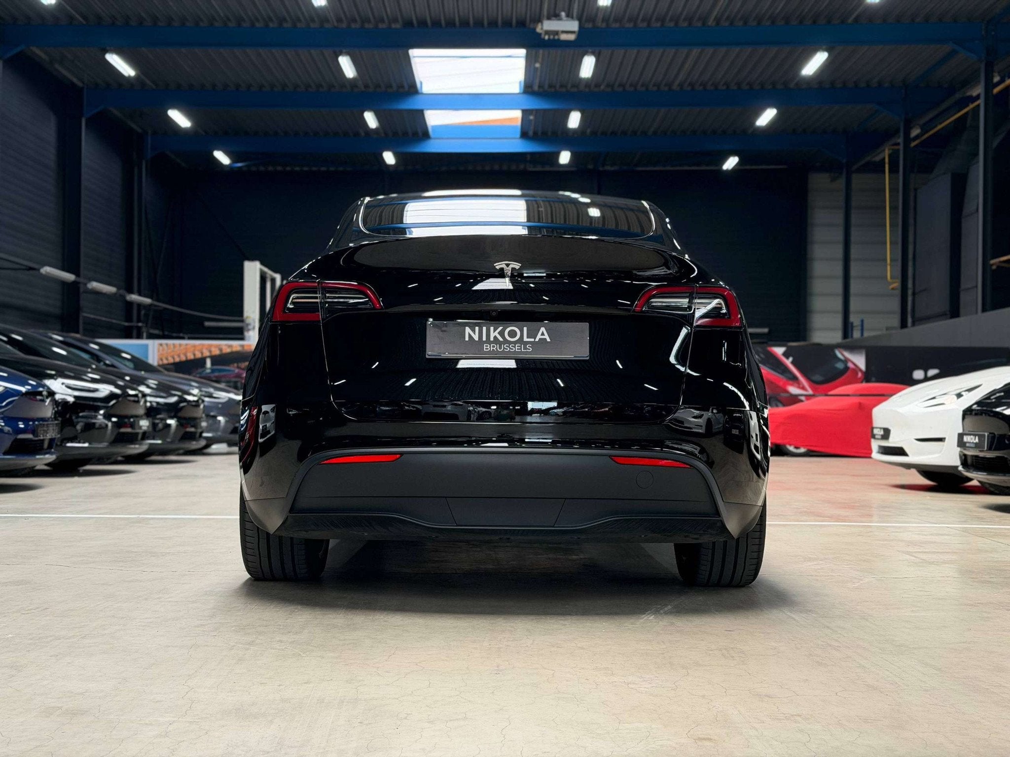 Tesla Model Y PREMIUM - RWD - HIGHWAY AUTOPILOT (bj 2024), Auto's, Achterwielaandrijving, Gebruikt, Zwart, Zwart