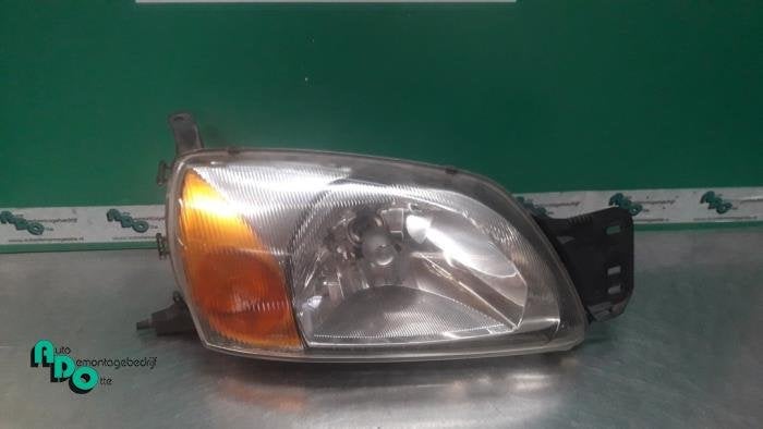 Koplamp rechts van een Ford Courier, Gebruikt, -, -, Ophalen of Verzenden