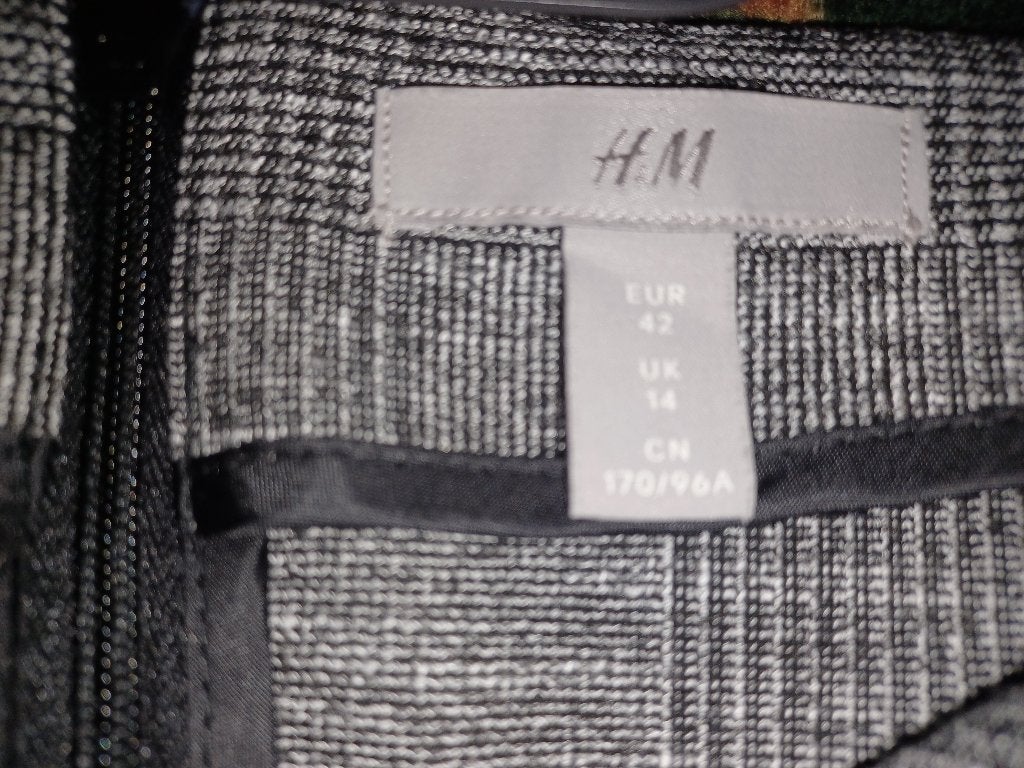 Kleedje maat 42 h&m donkergrijs, Enlèvement, Taille 42/44 (L), Gris, Au-dessus du genou