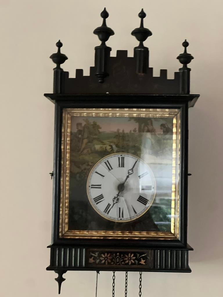 Klok met houten binnenwerk, Ophalen