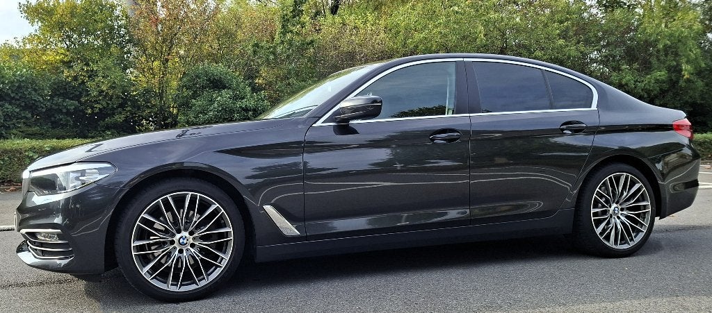 BMW 520i van 2018 met maar 91000km, Automaat, 4 deurs, Zwart, Lichtsensor