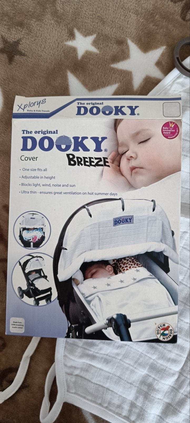 Dooky cover schaduwdoekje, Ophalen