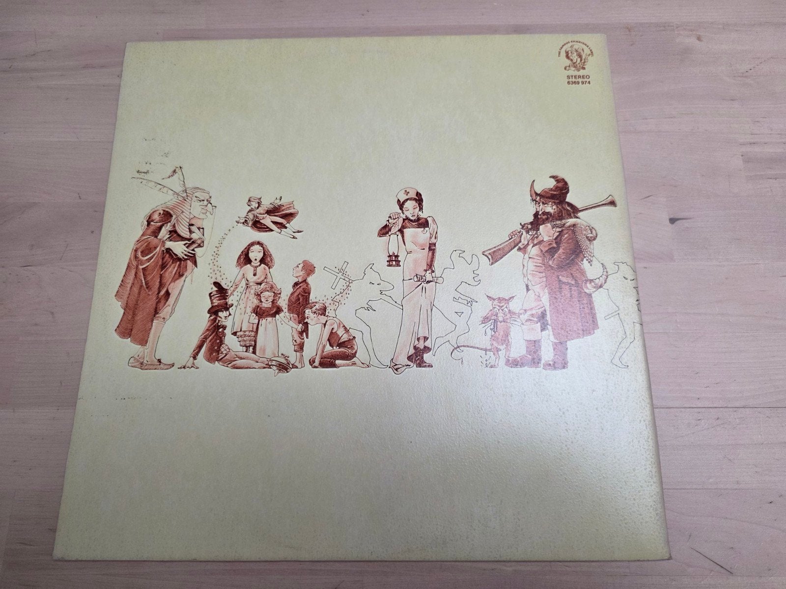 Vinyl 33T. Genesis  A trick of the Tail 1976, Pochette gatefold, Enlèvement