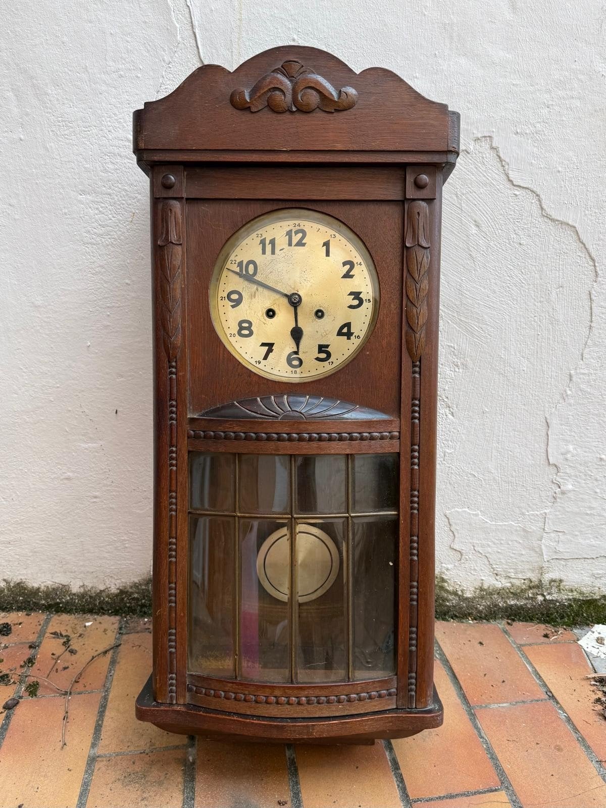 Antieke houten wandregulateur, Ophalen