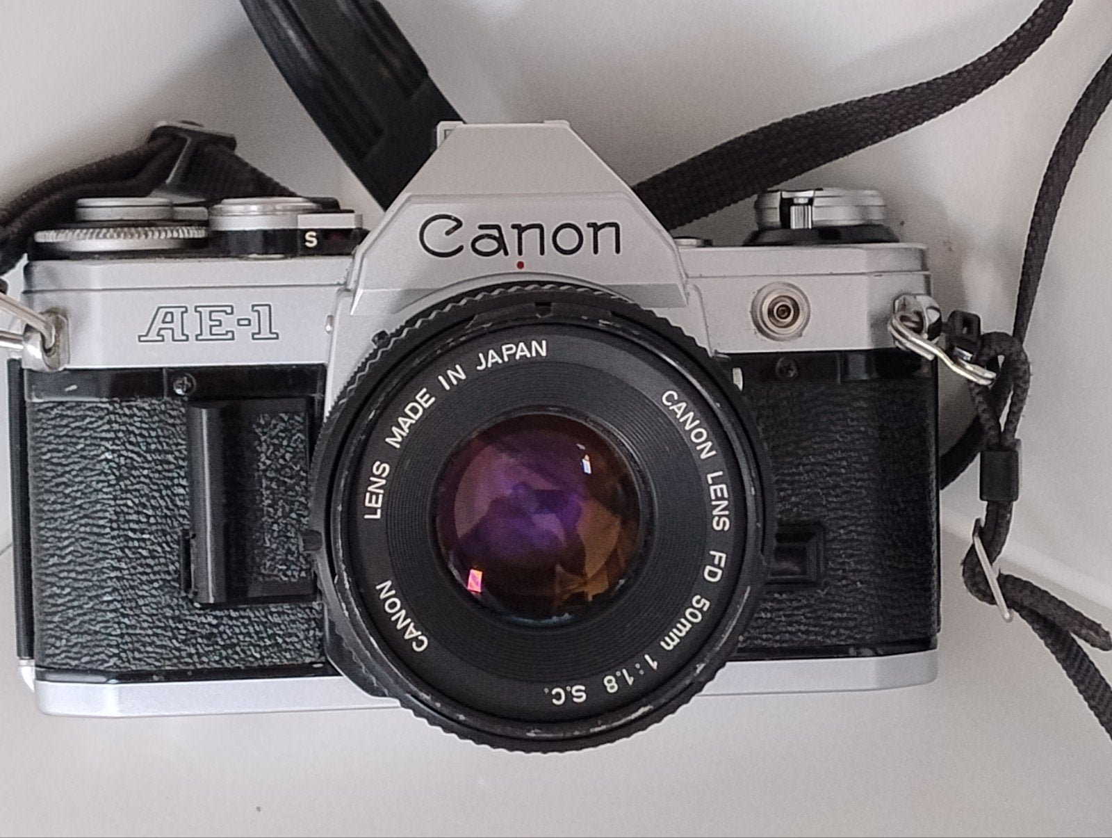 Canon AE1 Camera met een Canon FD 50mm 1:1.8 lens+Camerariem, Ophalen of Verzenden, Gebruikt, Spiegelreflex, Canon