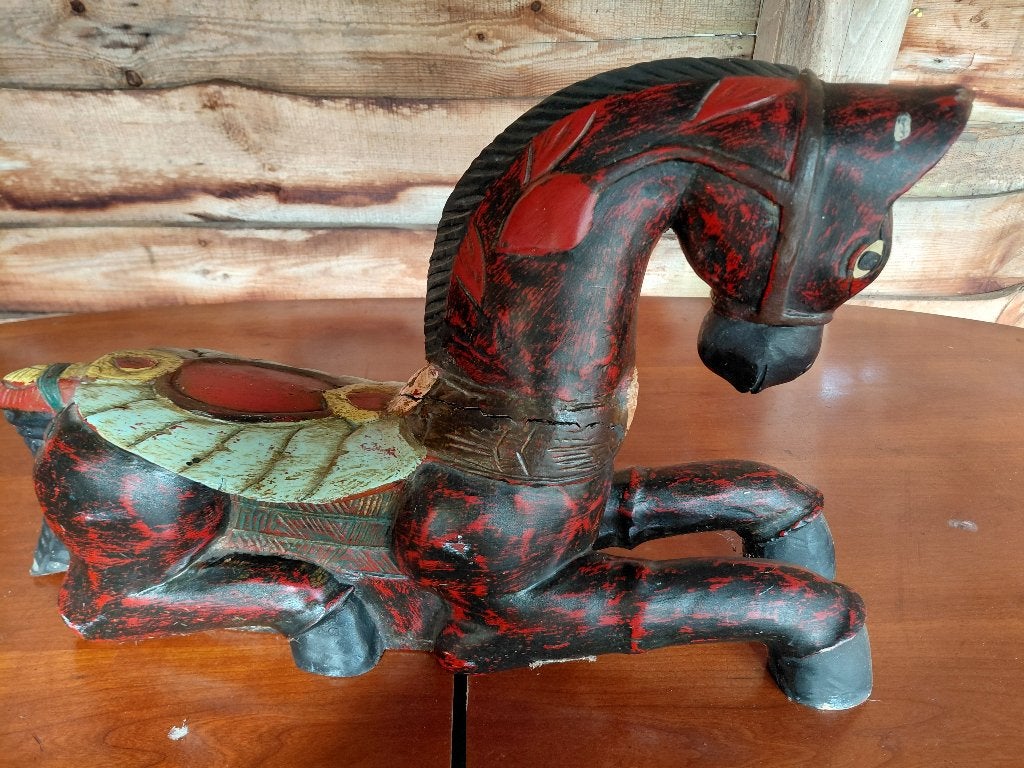 Antiek houten paard, Ophalen