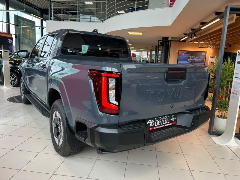 Toyota Hilux Double Cab Style EV 59,2 kWh, Auto's, Automaat, 145 kW, Zwart, Adaptive Cruise Control