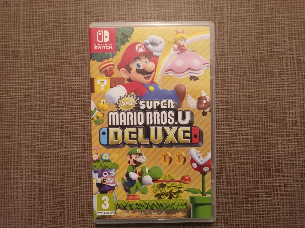 New Super Mario Bros. U Deluxe, Games en Spelcomputers, Games | Nintendo Switch, Ophalen of Verzenden, Zo goed als nieuw, Eén computer