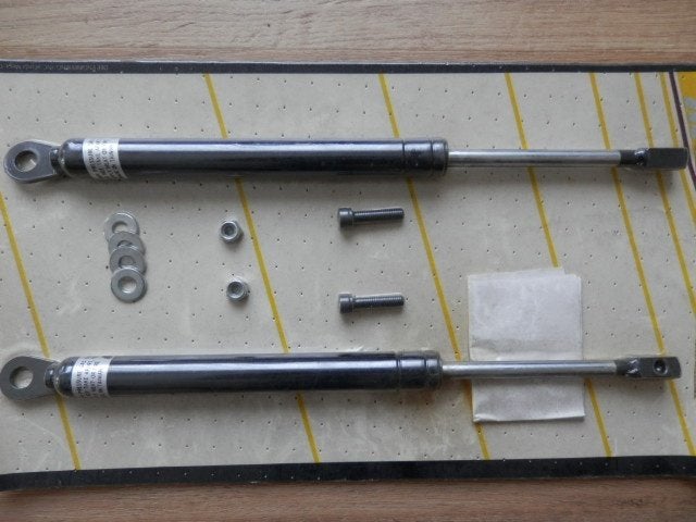 Gasdrukveren kofferklep VW Kever, Ophalen
