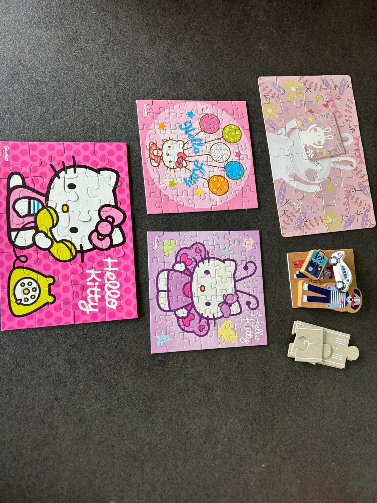Lot de puzzles pour enfants Hello Kitty et divers, Enlèvement ou Envoi, 10 à 50 pièces, Utilisé, 2 à 4 ans