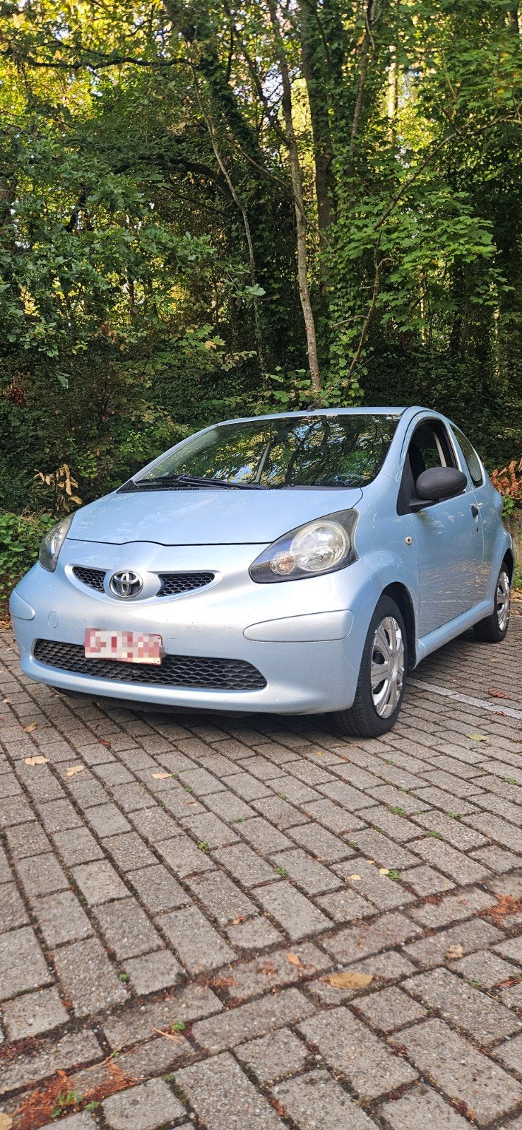 Toyota Aygo 1.0 essence prêt a l'immatriculation, Auto's, Voorwielaandrijving, Stof, Zwart, Blauw