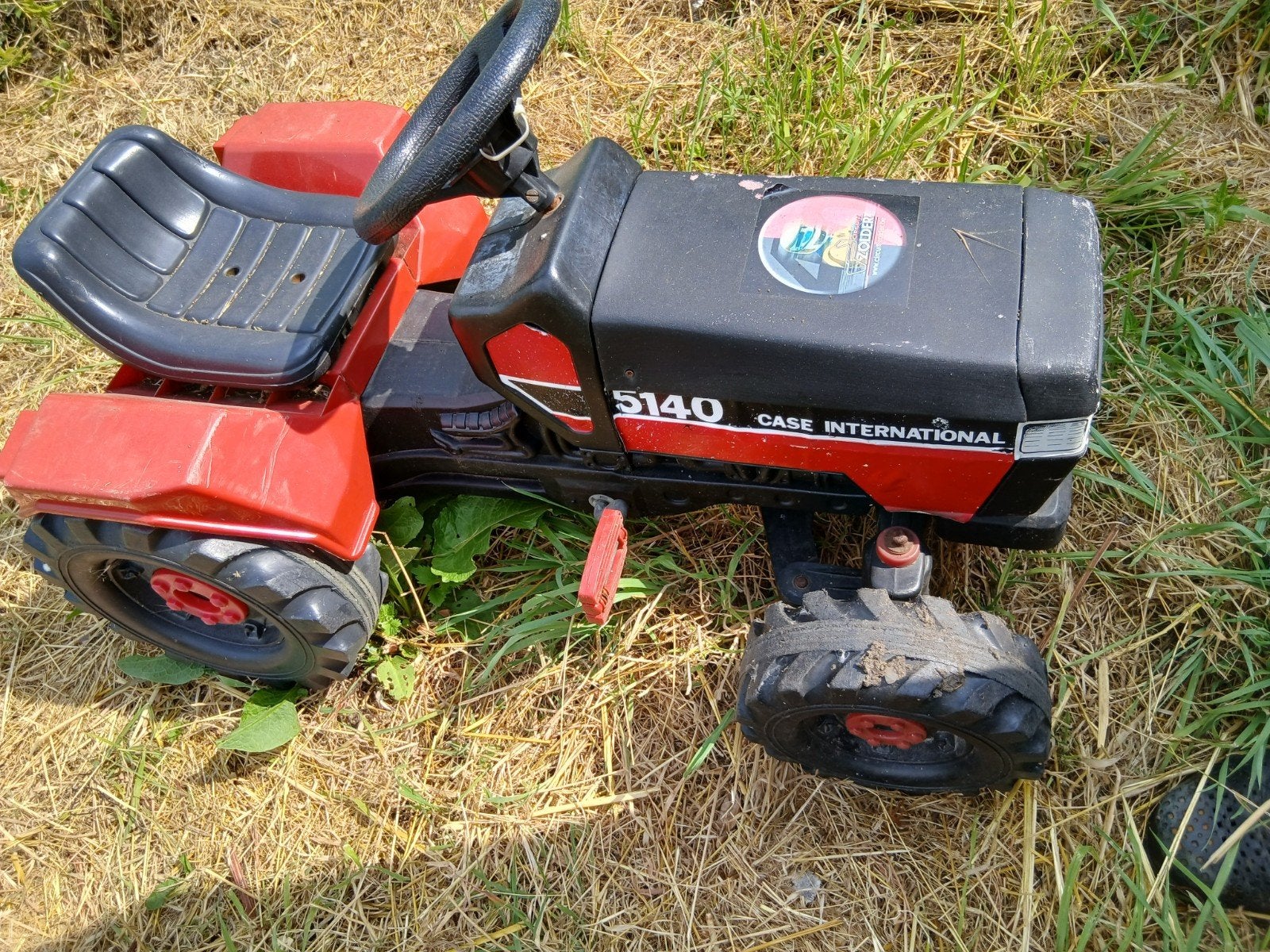 Kinder traktor met remorque, Ophalen