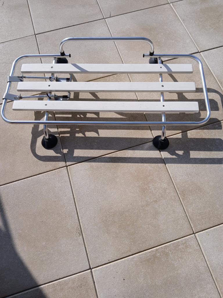 Portebagage voor op koffer deksel., Ophalen