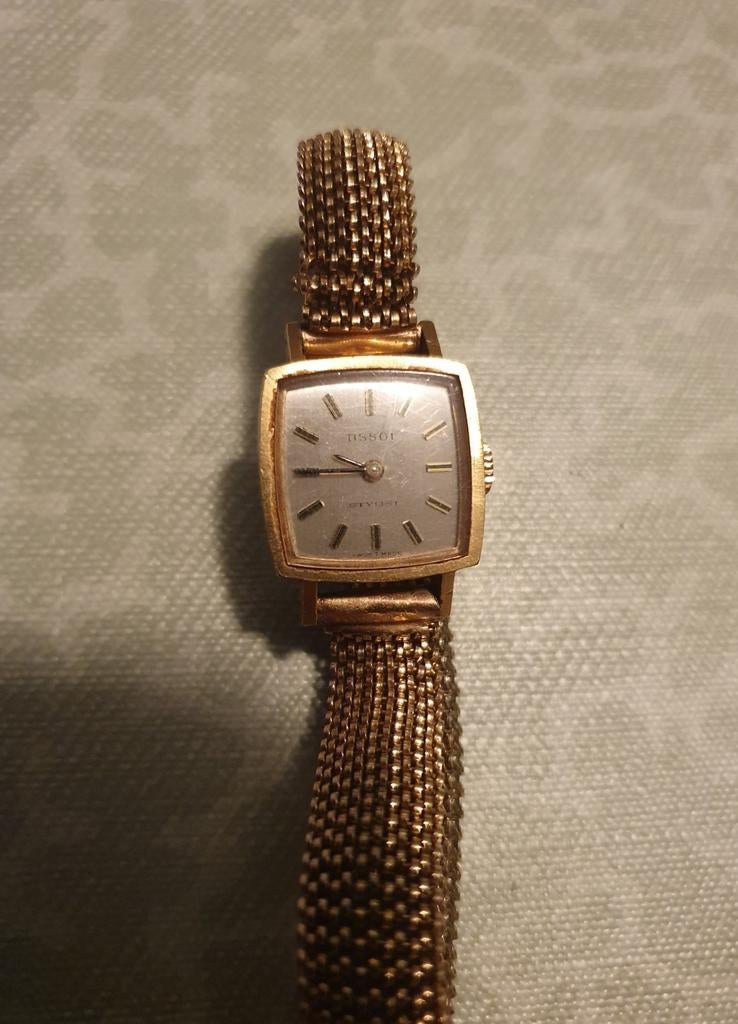 Tissot goudkleurig dameshorloge, Handtassen en Accessoires, Horloges | Dames, Ophalen of Verzenden