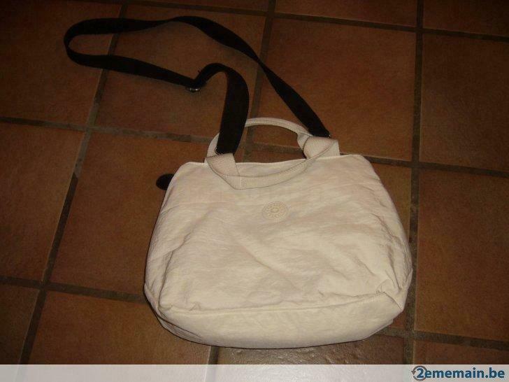 kipling sac blanc, Gebruikt