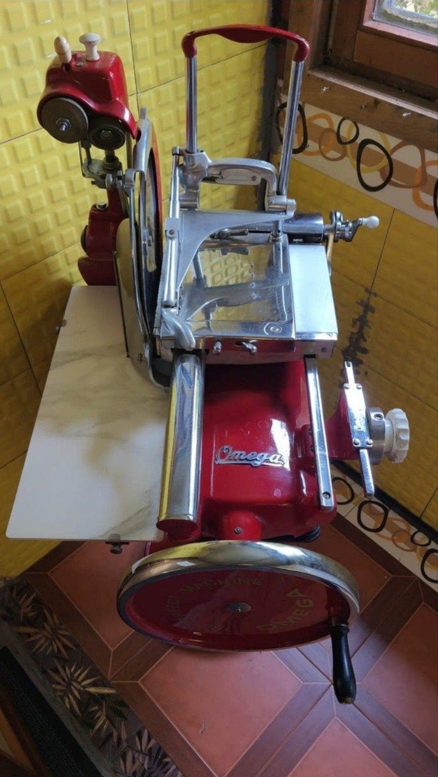omega snijmachine, Ophalen