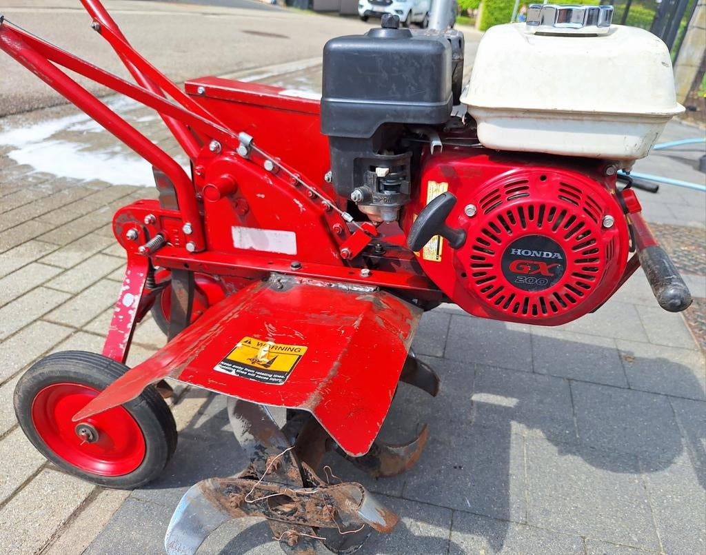 Tuinfrees met Honda motor, Ophalen