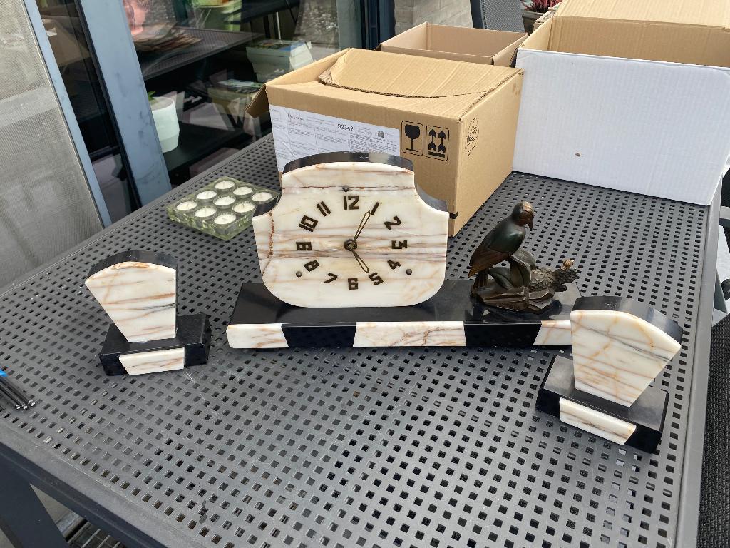 Schouwgarnituur art deco, Enlèvement