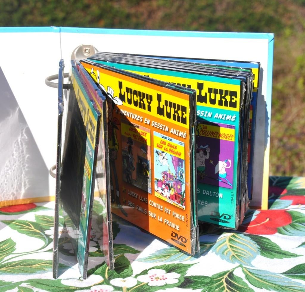 classeur avec 15 dvd neuf lucky luke edition atlas, Enlèvement ou Envoi, Neuf, dans son emballage, Dessin animé