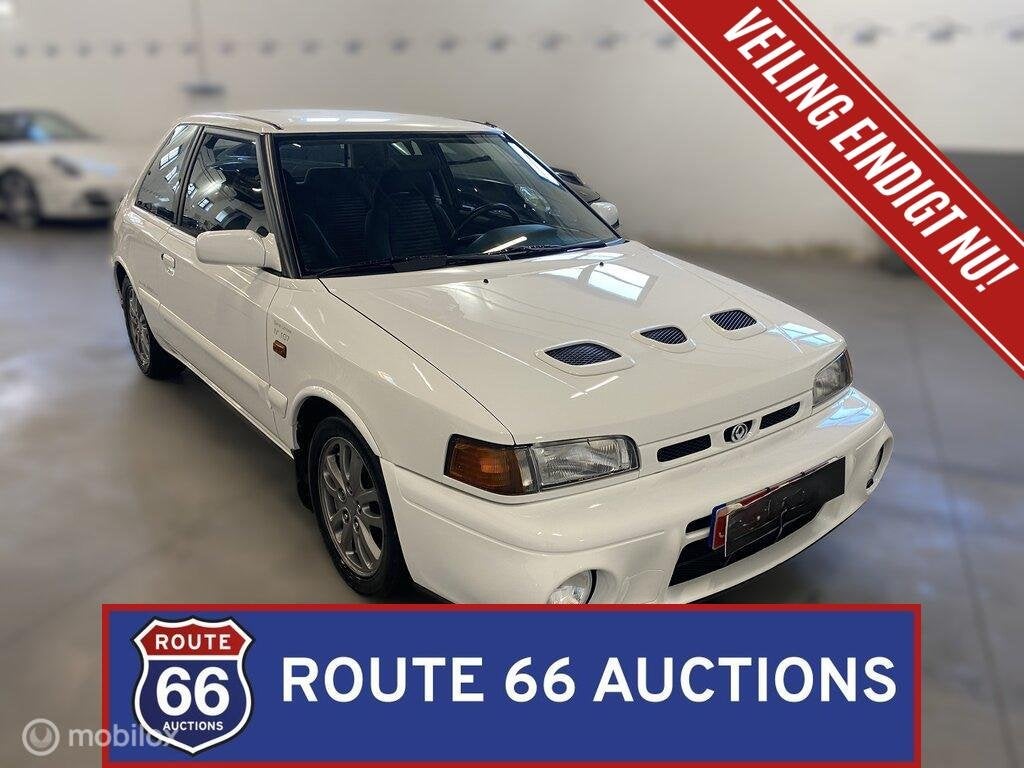 Mazda 323 GT-R | 1992 | Route 66 Auctions, Auto's, Zwart, Bedrijf, Handgeschakeld, Overige carrosserie