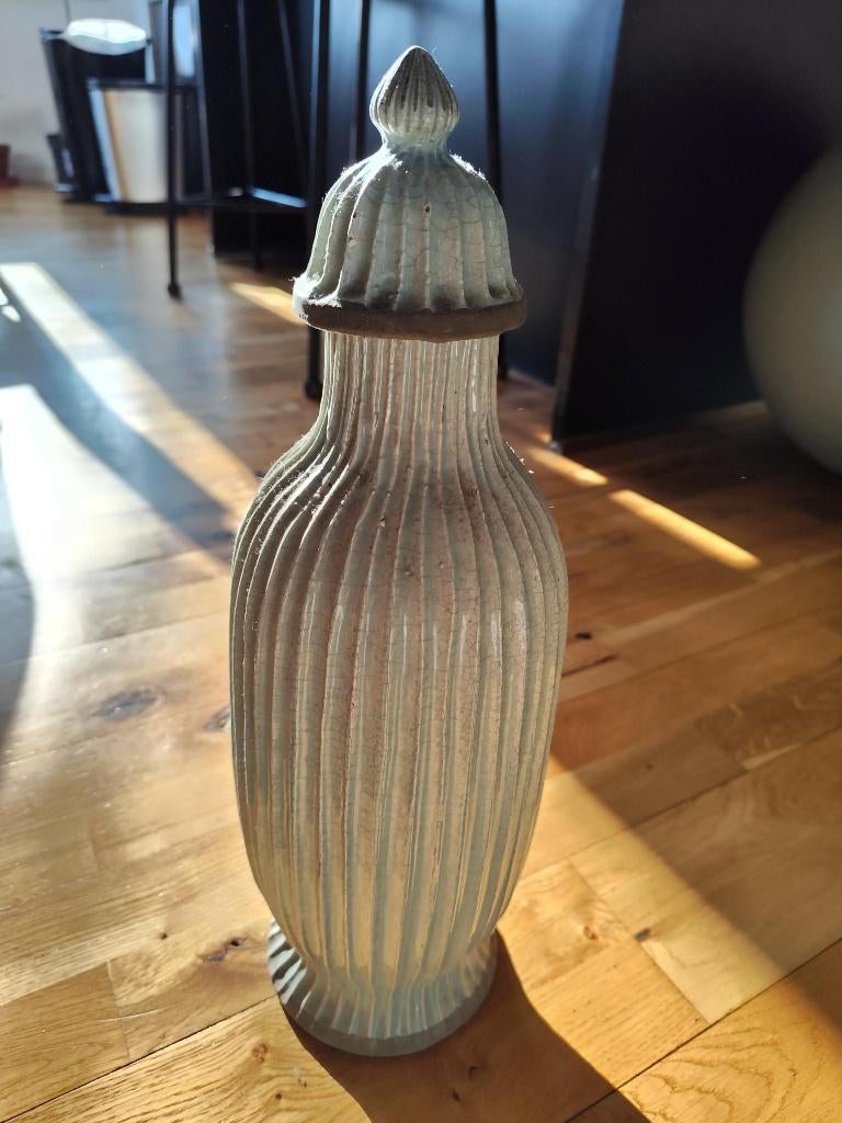 vente vase, Enlèvement