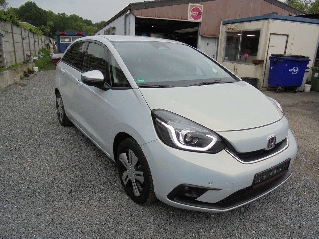 Honda Jazz 1.5i-MMD e:HEV Elegance + NAVI ENZ (bj 2021), Auto's, Automaat, 1304 kg, Stof, 4 cilinders