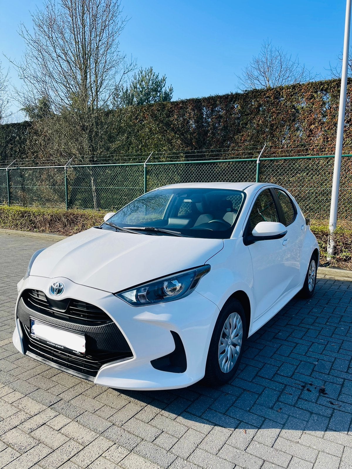 Toyota Yaris Hybride 2022!  66000km, Auto's, Stof, 4 cilinders, Wit, 1490 cc