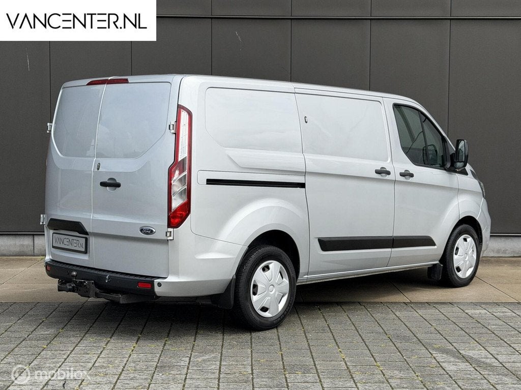 Ford Transit Custom L1 2.0 TDCI 131PK Automaat Trekhaak, Auto's, Bestelwagens en Lichte vracht, Voorwielaandrijving, Stof, Zwart