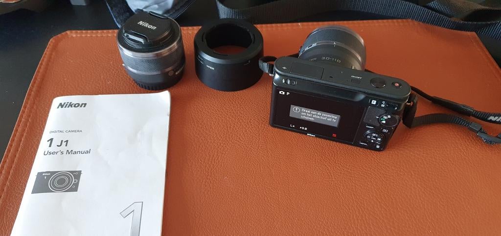 Nikon 1J1, Enlèvement, Nikon