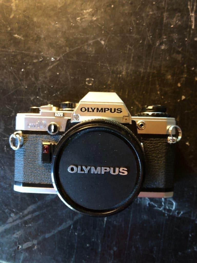 Olympus OM 10, Enlèvement, Olympus