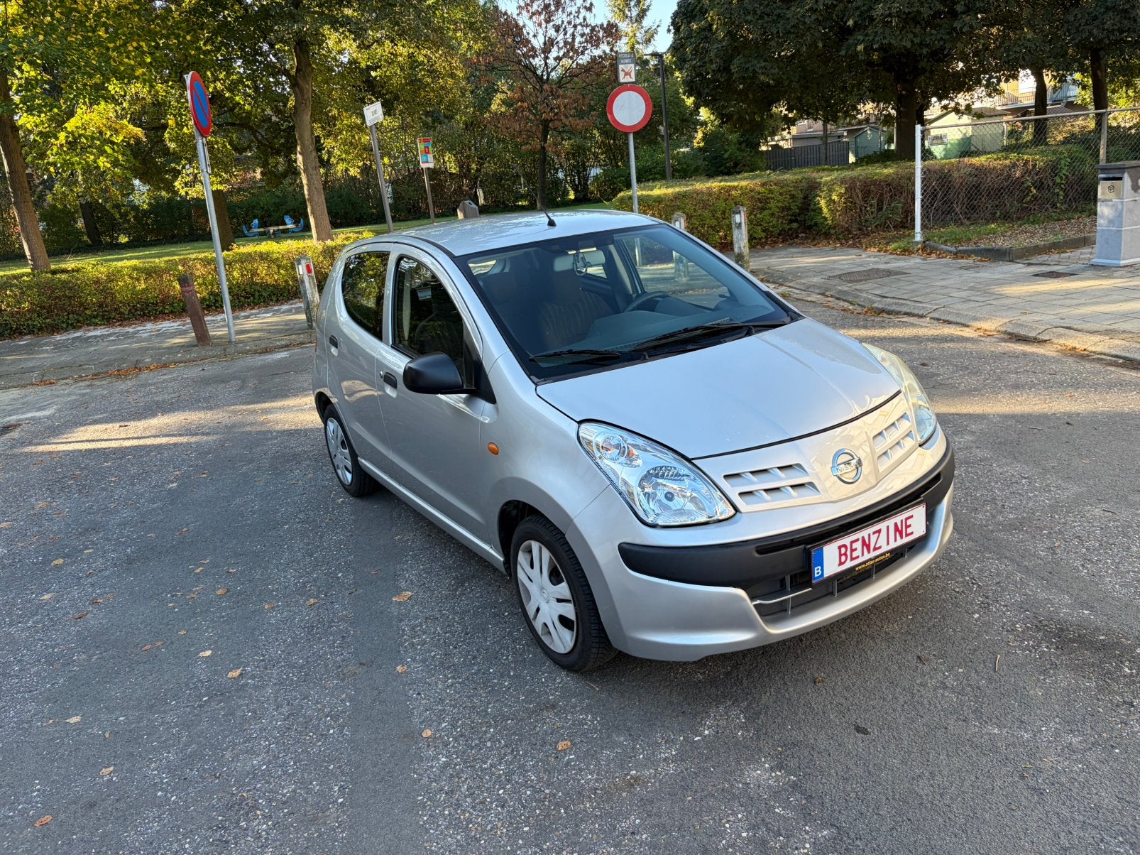 Nissan Pixo 1.0 benz 103506 km 2012 garantie, Auto's, Stof, 50 kW, Zwart, Handgeschakeld