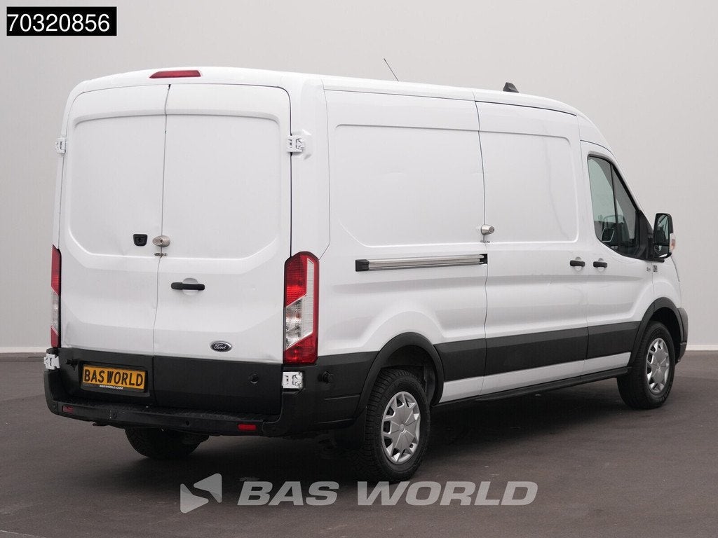 Ford e-Transit 184pk L3H2 L3 Elektrisch 68kWh 317km WLTP Nav, Auto's, Bestelwagens en Lichte vracht, Automaat, Stof, 135 kW, 184 pk