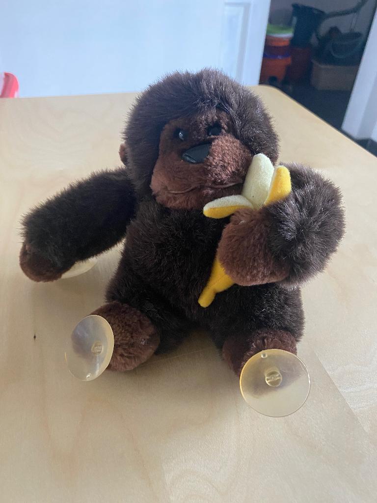 Pluche aap, met banaan en zuignappen, Kinderen en Baby's, Ophalen of Verzenden, Aap