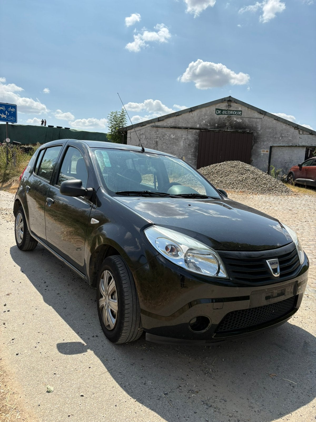 Dacia Sandero 1.2 16V LPG Benzine Zeer zuinig – 233.000 km –, Auto's, 4 cilinders, 1198 cc, Zwart, Bedrijf