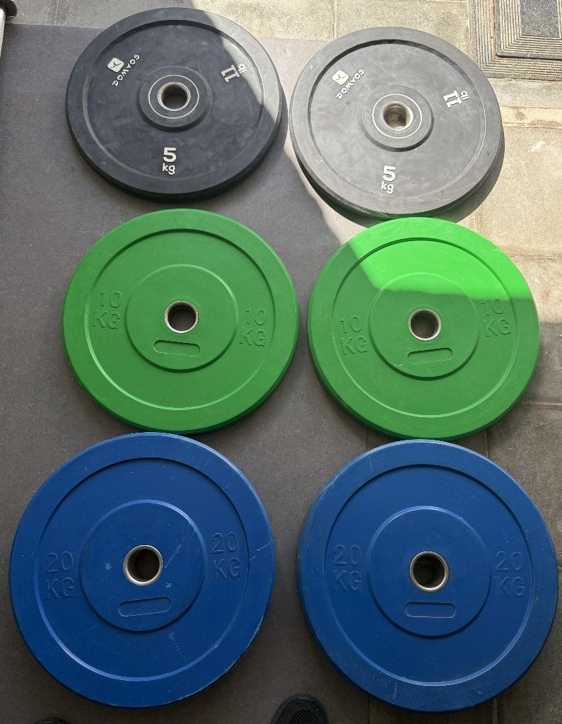 70 kg olympische bumper plates – 50 mm – halterschijven, Ophalen, Gebruikt, Benen, Halterschijven