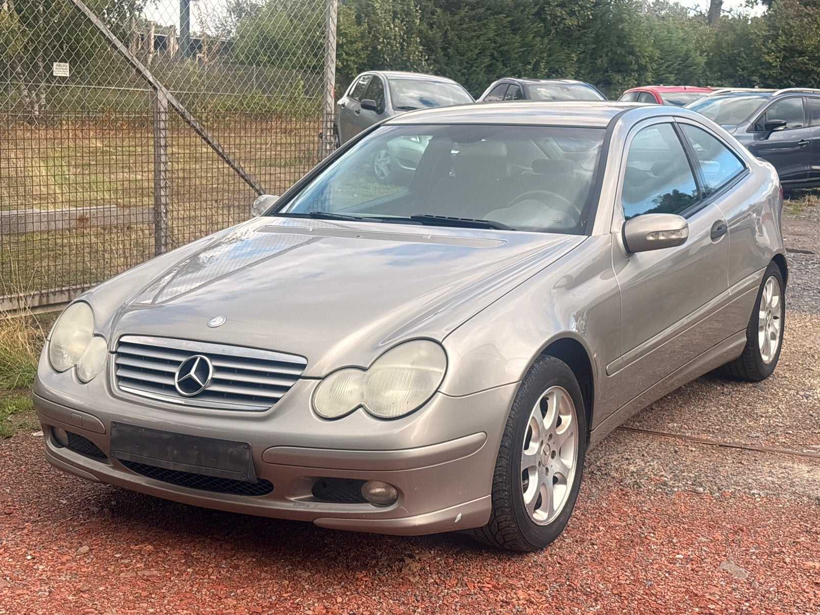 Mercedes C220 CDI Sport Coupé, Auto's, 100 kW, Zwart, 1505 kg, Beige