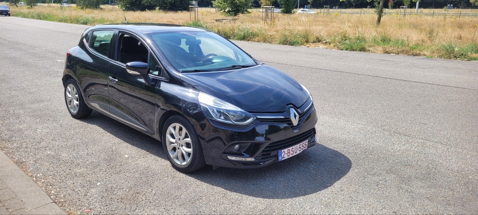 Renault Clio Automaat, Navi,1 Jaar Garantie.., Auto's, 4 deurs, 4 cilinders, Zwart, Bedrijf