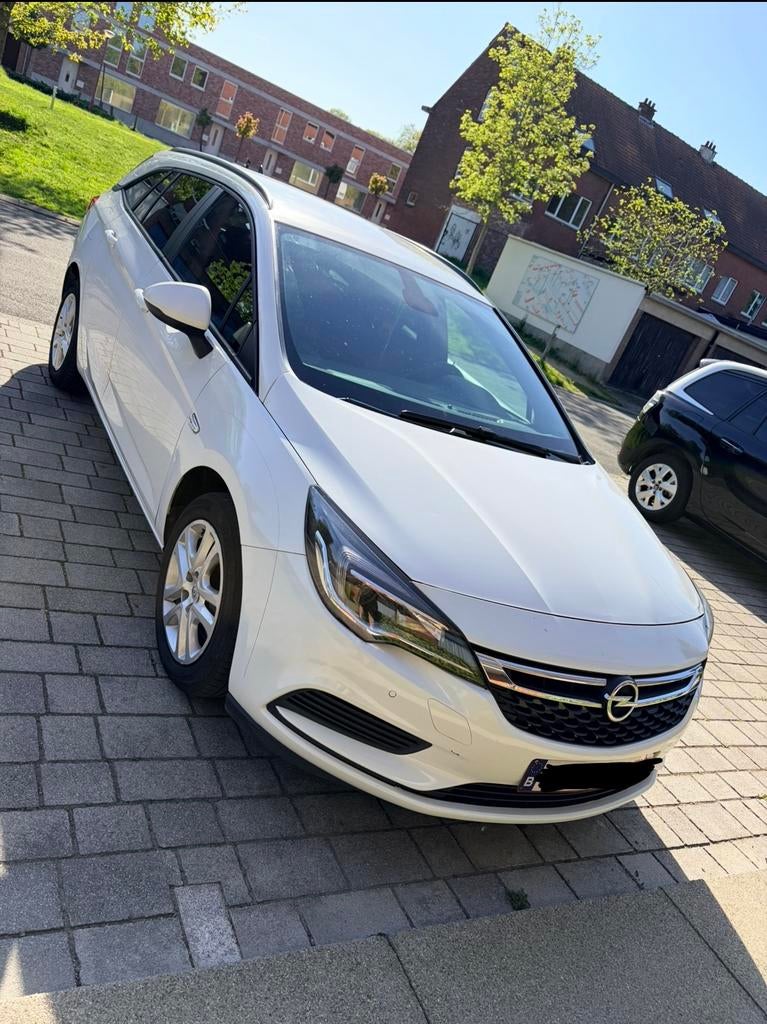 Opel Astra Sports Tourer AUTOMAAT 2016, Auto's, Automaat, Wit, 5 deurs, Particulier