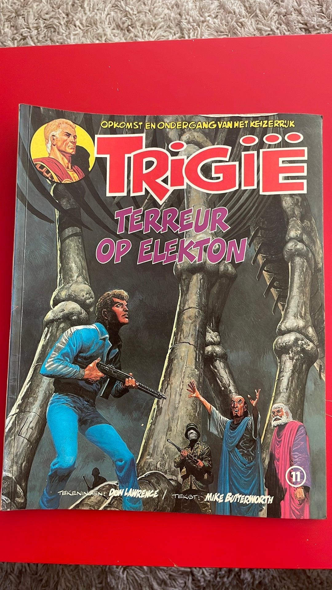 Trigië 11 - Terreur op Elektron Lawrence / Butterworth, Boeken, Ophalen of Verzenden, Gelezen, Don Lawrence