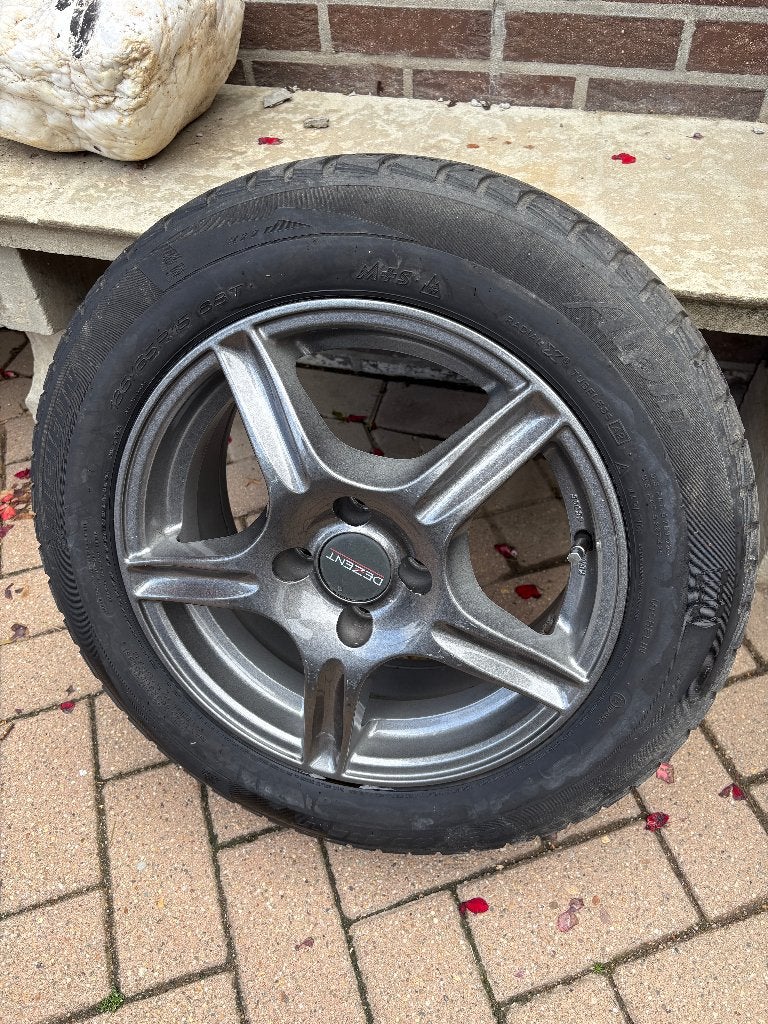 4 Winterbanden op aluvelgen “Dezent “  185/65R 15. 88T, Ophalen, Gebruikt, 15 inch, Banden en Velgen