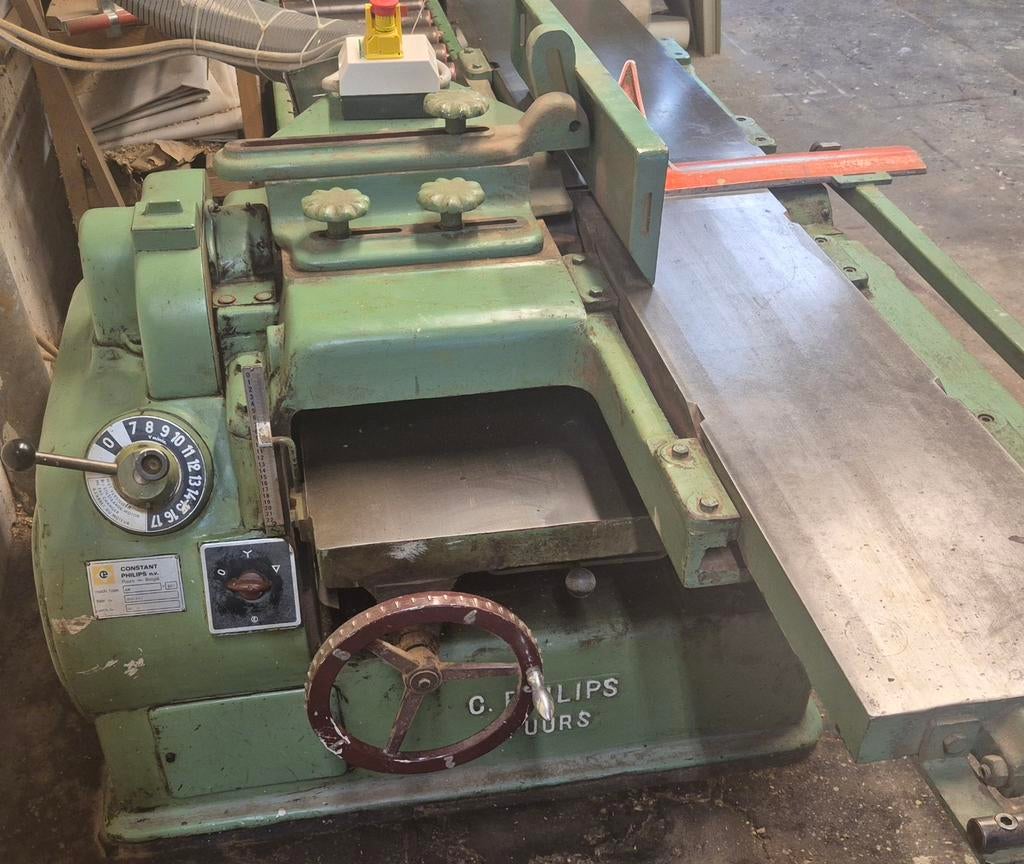 Constant Philips vlak en vandikte schaafmachine, Enlèvement