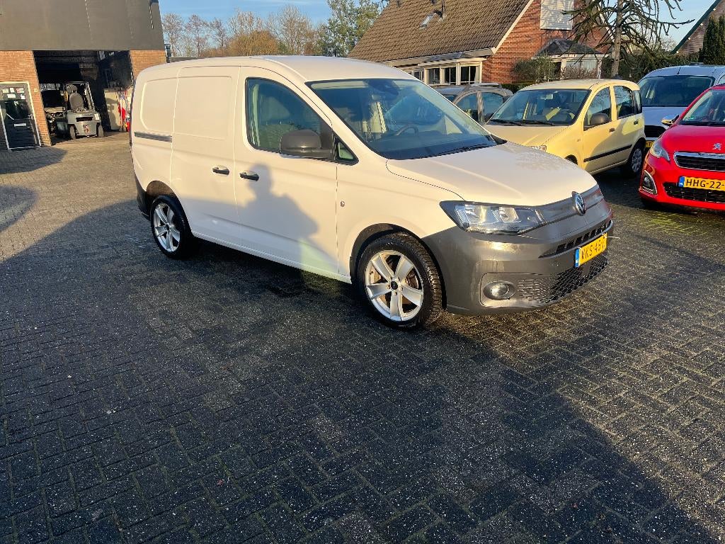 Vw caddy 2.0 TDI  2021 met klep., Auto's, Bestelwagens en Lichte vracht, Voorwielaandrijving, 4 deurs, Stof, 4 cilinders