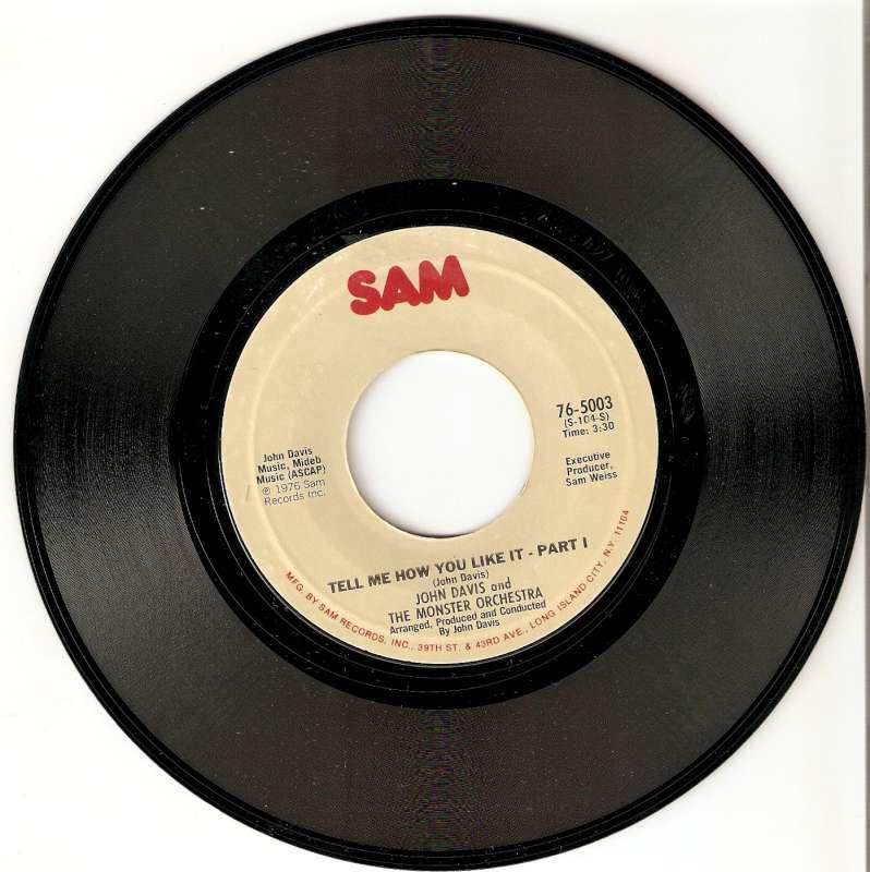 single John Davis - Tell me how you like it, CD & DVD, Vinyles Singles, Enlèvement ou Envoi, Single, Comme neuf, Musique de films et Bande son