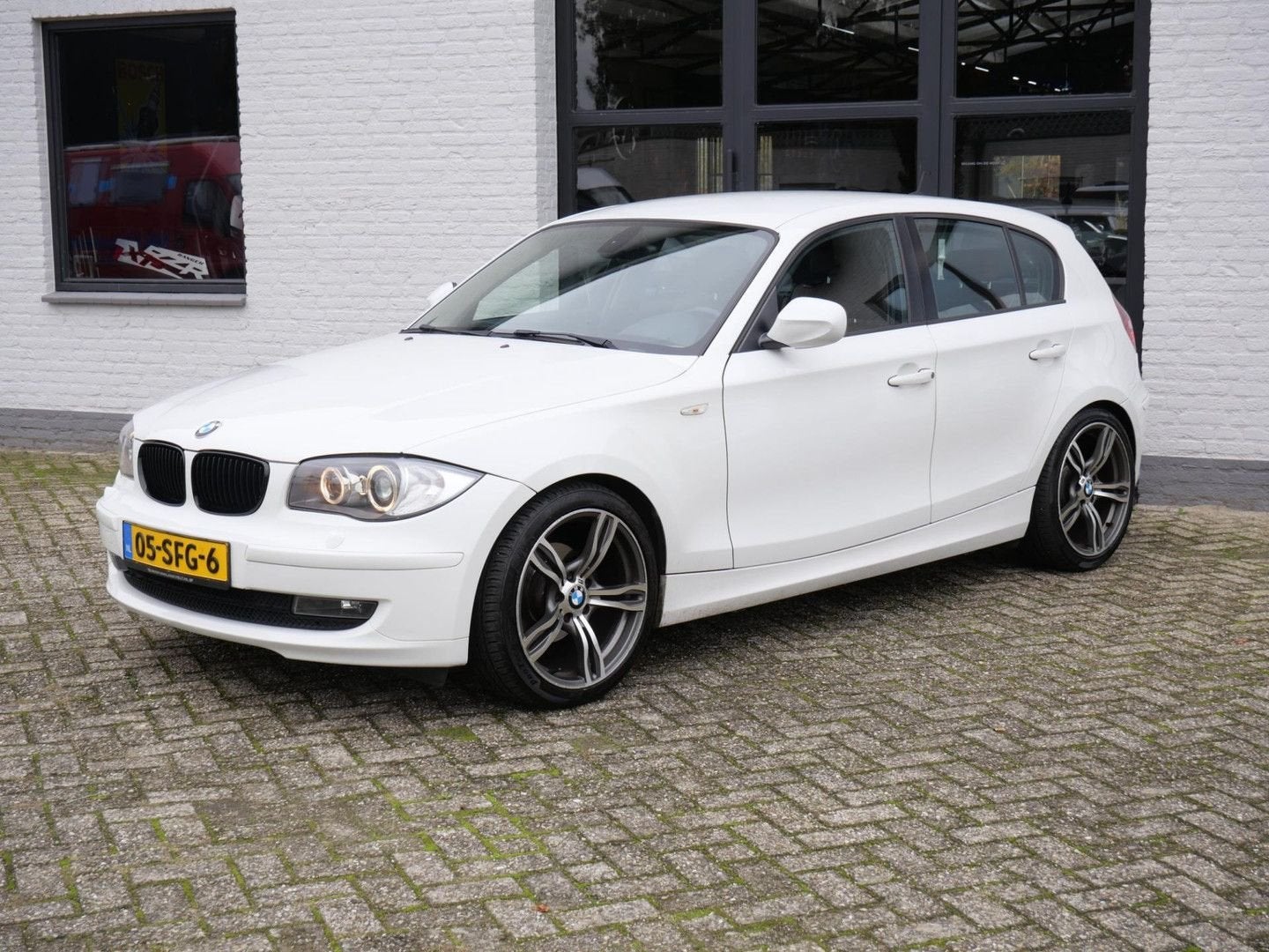 BMW 116 1-serie 116i 2.0 Ecc leder Xenon Origineel NL, Auto's, 1 Reeks, 140 g/km, Wit, Elektrische ramen