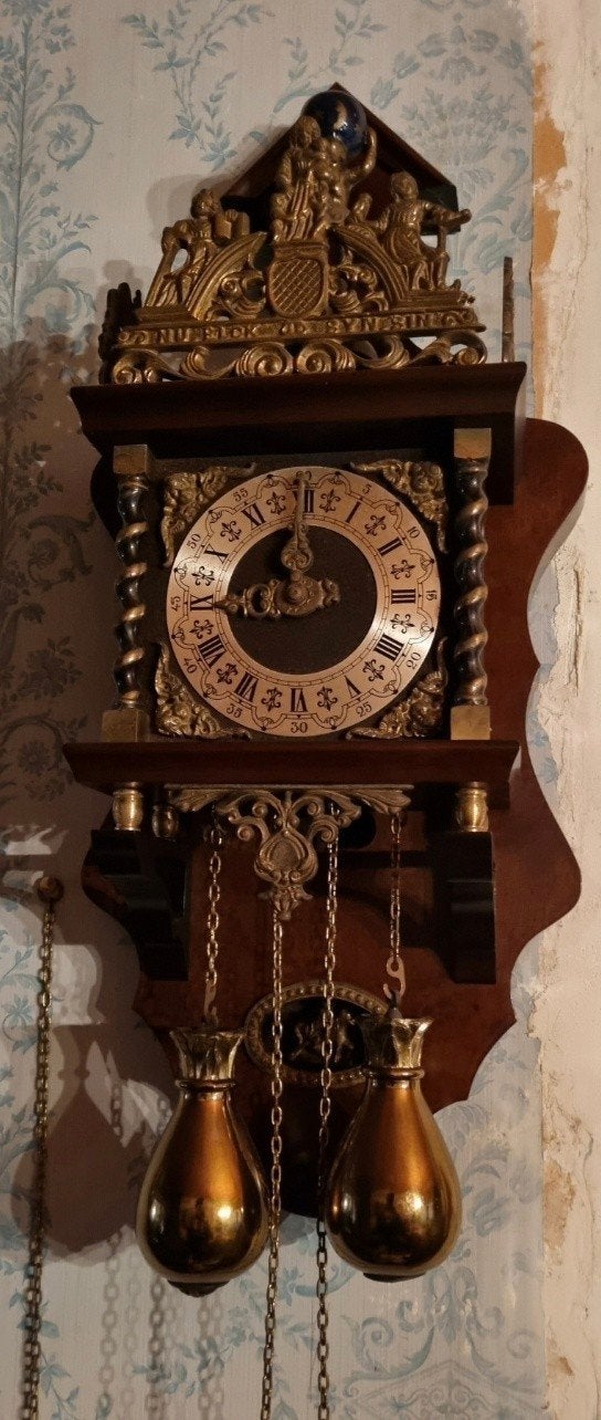 Zaanse klok, Ophalen