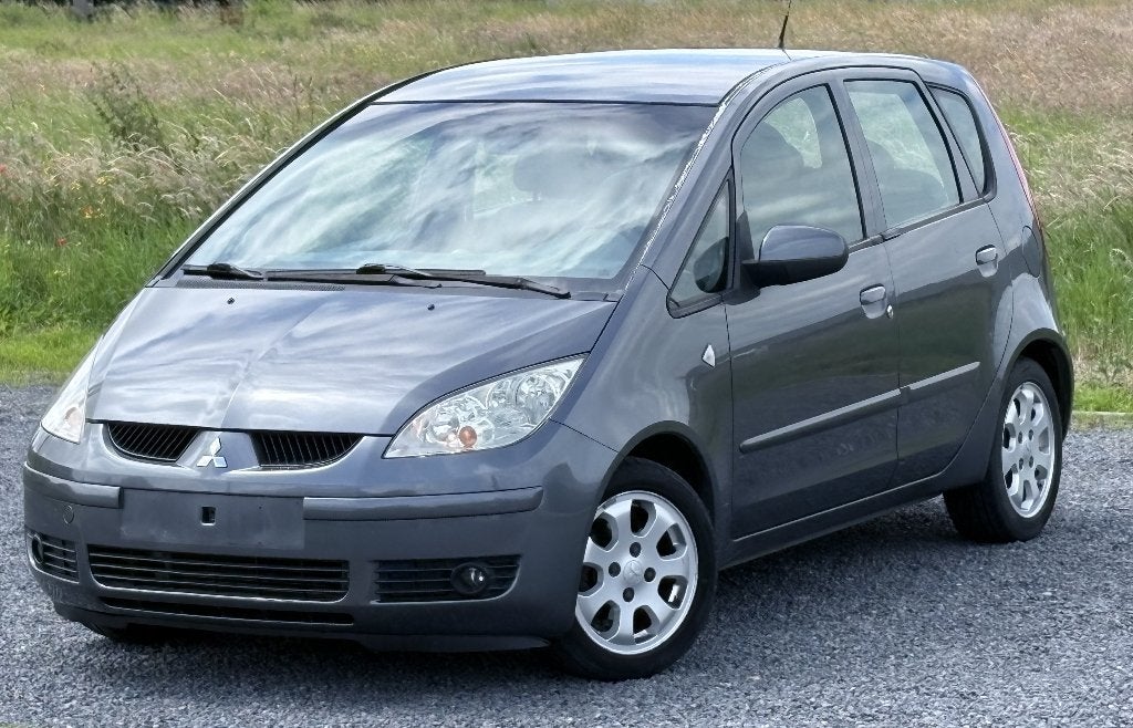 Mitsubishi Colt 1.3 Benzine airco full service, Autos, Mitsubishi, Argent ou Gris, Achat, 1299 cm³, Boîte manuelle