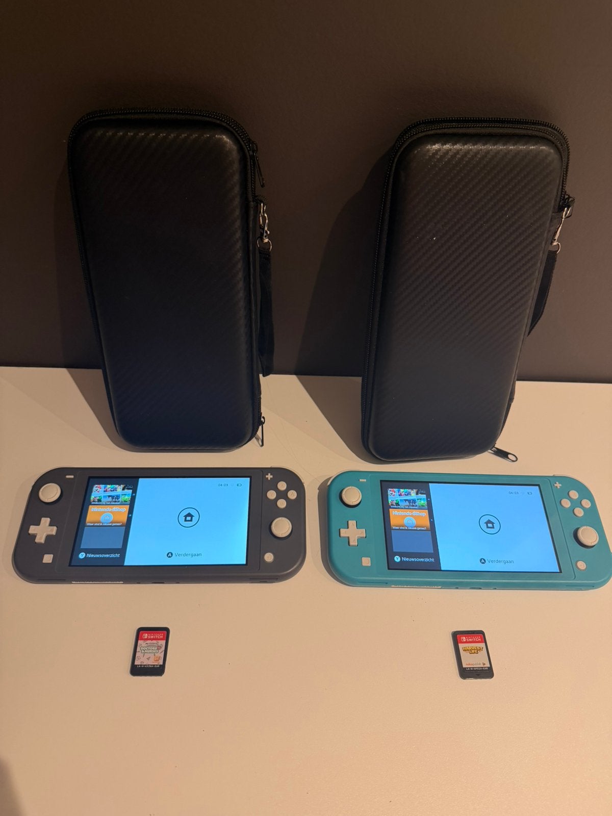 Nintendo Switch Lite – 2 stuks + games, Games en Spelcomputers, Ophalen of Verzenden, Zo goed als nieuw